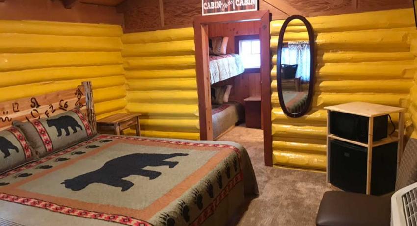Ashton Log Cabin Rentals, Cabin 1 - bed
